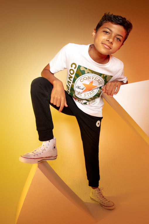 Boys wearing converse shoes best sale